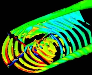 Interaction Pale-Tourbillon : visualisation du coefficient de pression sur les pales et de la vorticite dans le sillage de la pale reculante